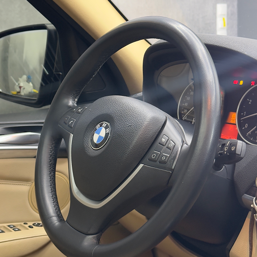 Thanos Designs BMW X3 Steering Wheel Close Up