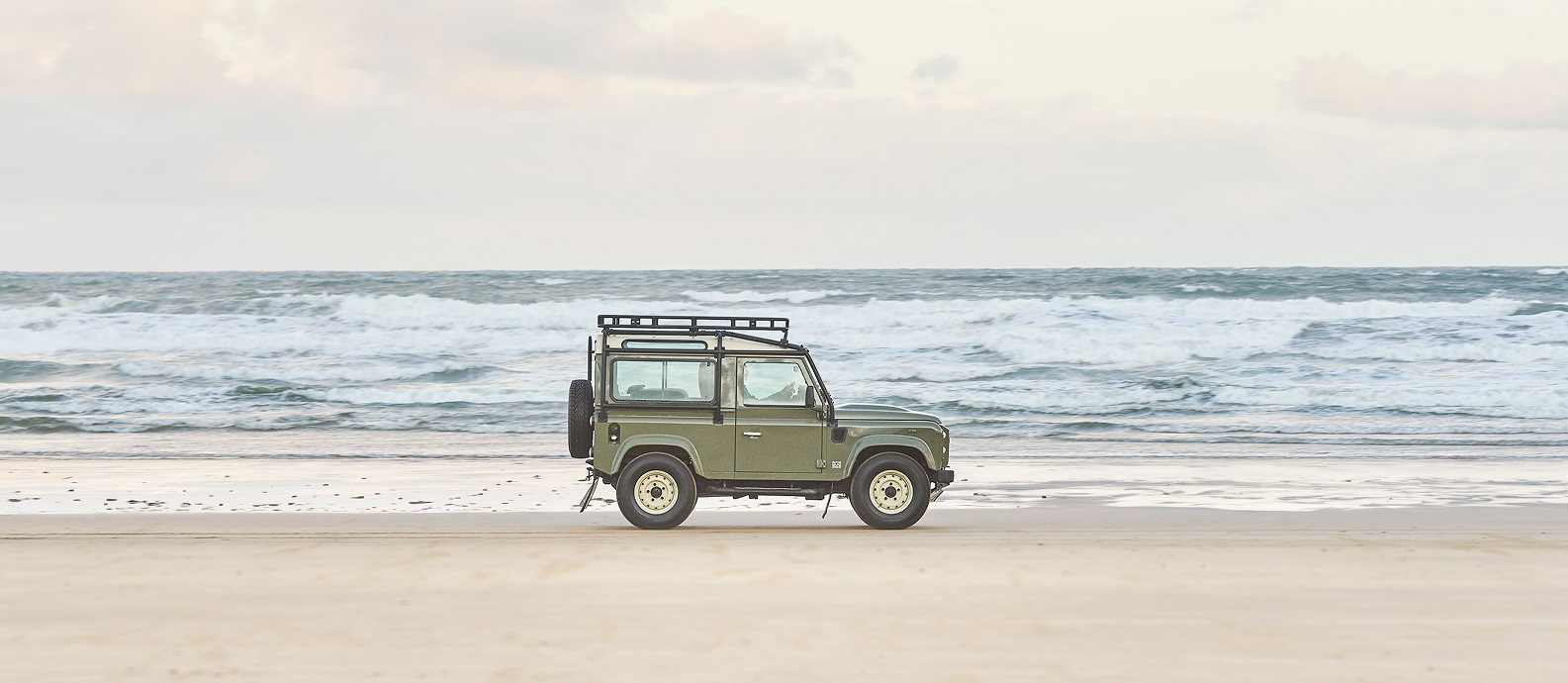Thanos Designs Land Rover Defender Side View Beach